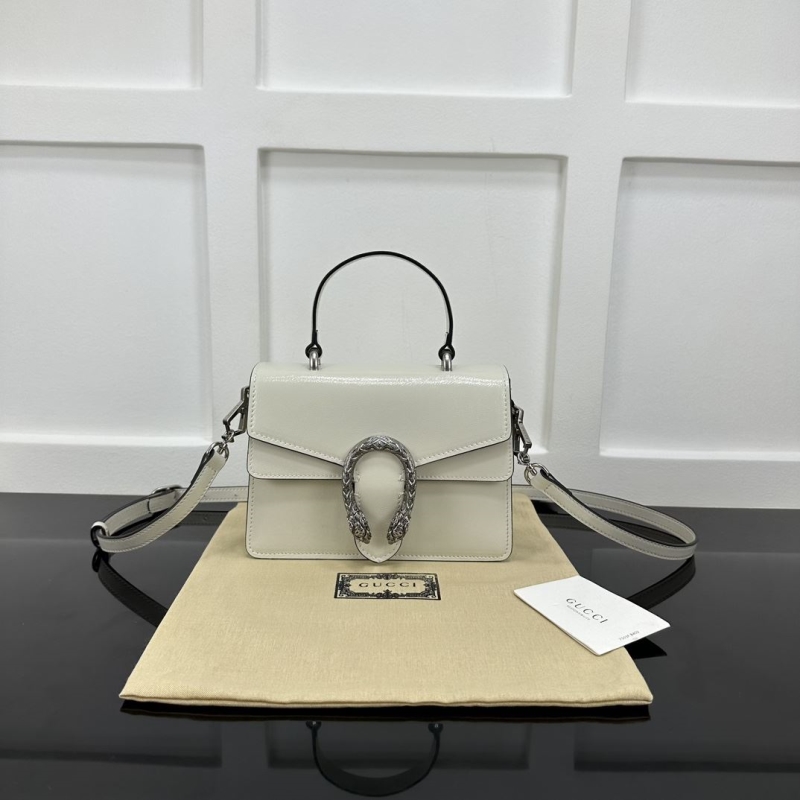 G*u*i top handle bags